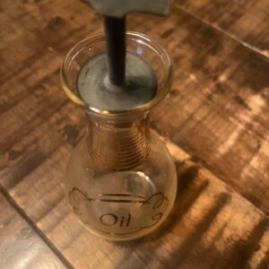 Vint Pyrex oil jar.